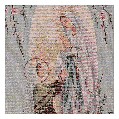 Apparition at Lourdes tapestry with light blue background 19x12" 2