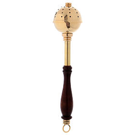 Aspergillum made of gilded brass with wooden handle