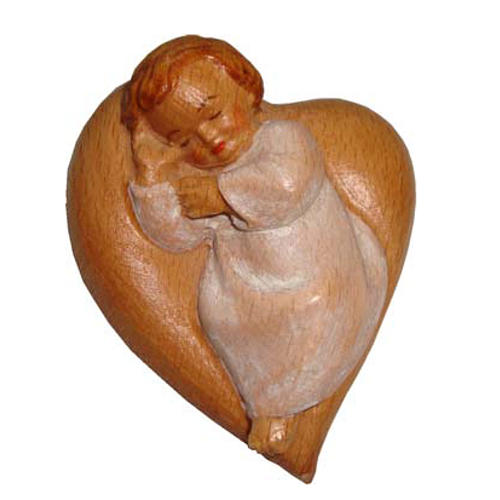 Angel on wooden heart, painted with white vestment 1