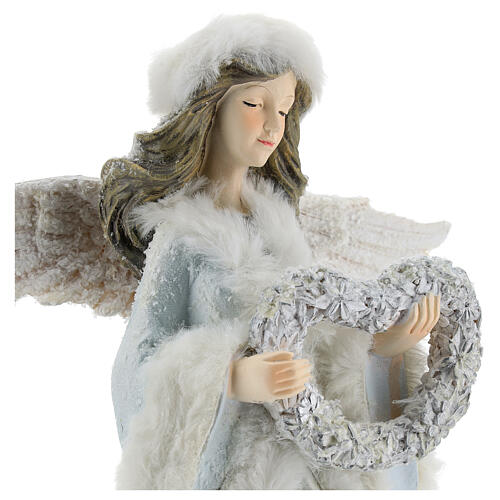 Resin angel with heart shaped wreath of flowers 14 in 2