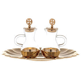 Cruets with decorated caps and gold plated tray
