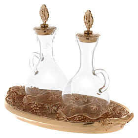 Glass cruets with gilded tray