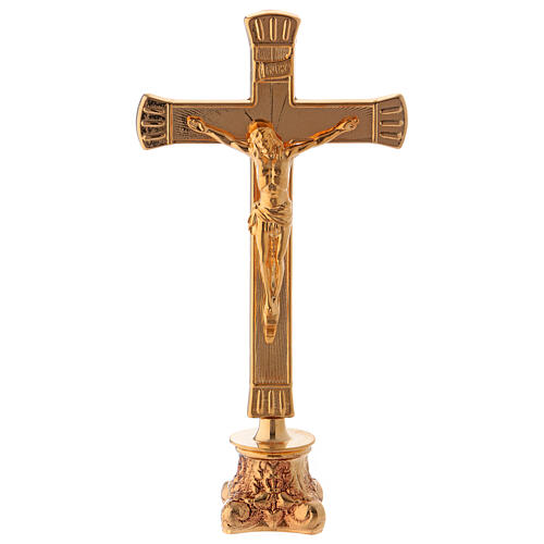 Altar crucifix in polished golden brass with four antique feet base 1
