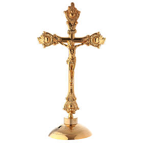 Standing crucifix of polished gold plated brass, 38 cm