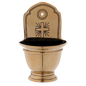 Holy water font in golden brass with Cross