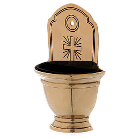 Holy water font in golden brass with Cross