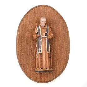 Platte mit Statue des Padre Pio
