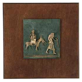 Flight from Egypt, bronze tile of San Zeno of Verona on antique finish wood