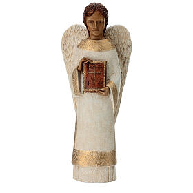 Angel figurine with book for rural crèche