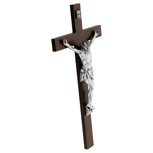 Dull silver body of Christ with dark wooden cross, Valenti, 25 in 4
