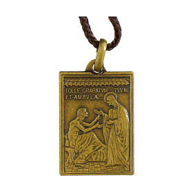 Brass medal with tile of St. Peter's Holy Door