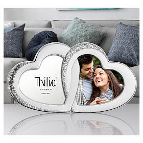 Cornice Thilia alluminio argentato due cuori intrecciati 15x30 cm