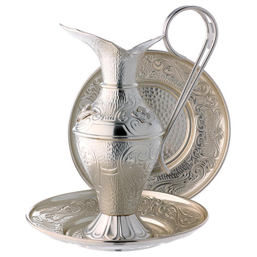 Ewer set with chiselled angels 1