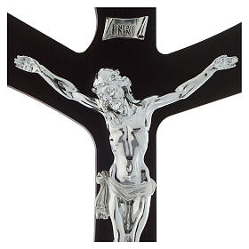 Stylized wood crucifix with body of silver foil