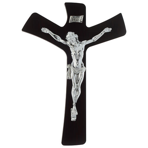Stylized wood crucifix with body of silver foil 1