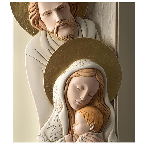 Holy Family, vertical bas-relief in painted resin and wood with golden details 2