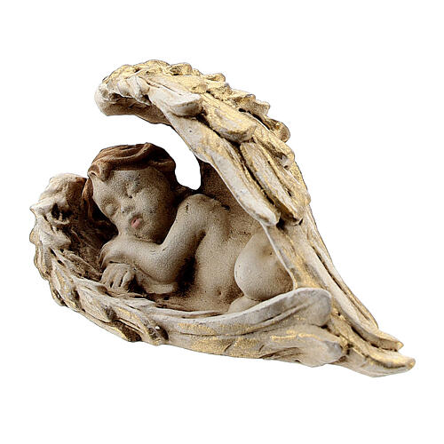 Sleeping angel on wings figurine in resin 2