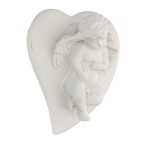 Resin angel statue lying on heart 2