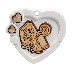 Heart-shaped charm with mitre and crozier, plaster, 1.5 in