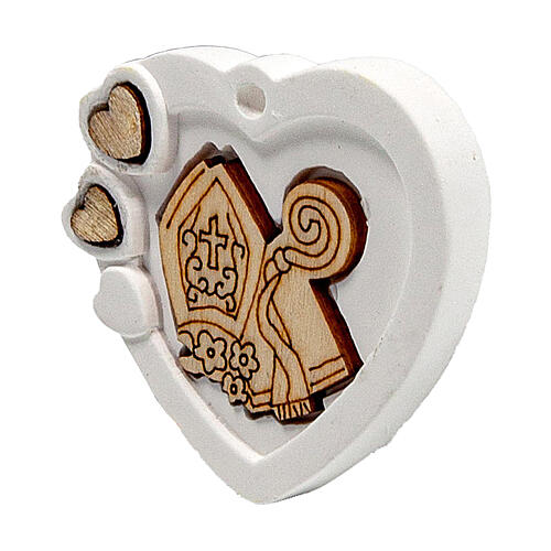 Heart-shaped charm with mitre and crozier, plaster, 1.5 in 2