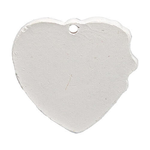 Heart-shaped charm with mitre and crozier, plaster, 1.5 in 3