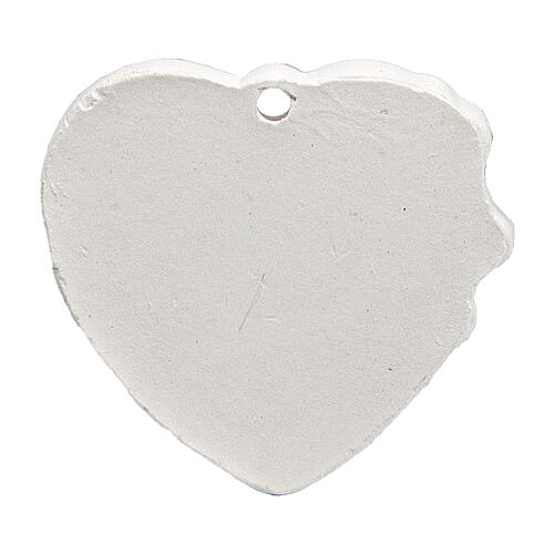 Heart-shaped charm with chalice and wheat, plaster, 1.5 in 2