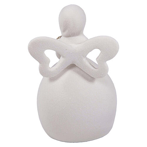 Angel-shaped favour with cut-out hearts and LED light, h 4 in 3