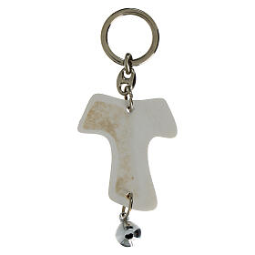 Tau-shaped keychain with Holy Mary image and white bell, resin, h 5 in