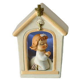 Praying girl in a church, favour