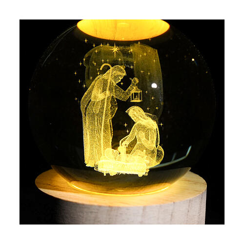 Illuminated crystal globe with Holy Family, wooden base, 3.5 in 3
