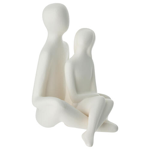 Porcelain set of seated lovers, 7.5 in 5