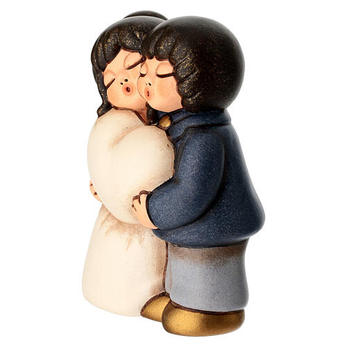 Small THUN seated embracing couple, wedding figurines 2