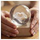 Crystal sphere with hands forming heart, square base 6 cm s3