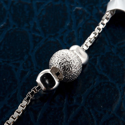 Silver decade bracelet with slipping grains 4
