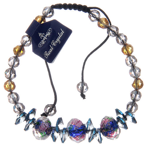 Bracelet with cord, crystal grains and blue roses 1