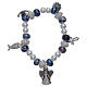 Elastic bracelet with grains decorated in blue and pendants with Christian symbols s1