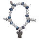 Elastic bracelet with grains decorated in blue and pendants with Christian symbols s2