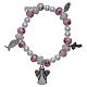 Elastic bracelet with grains decorated in pink and pendants with Christian symbols s1