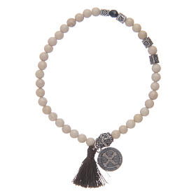 Bracelet with Saint Benedict medal and fossil grains