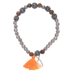 Bracelet with cross and tiger eye grains