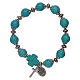 Elastic bracelet turquoise glass grains 10 mm with cross s2