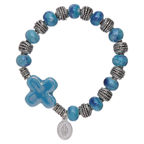 Elastischer Armband Keramik Perlen 10x8mm mit hellblauen Kreuz 1