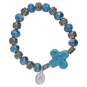 Elastic bracelet with ceramic grains 10x8 mm and light blue cross