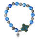 Elastic bracelet with ceramic grains 10x8 mm and light blue cross s2