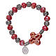 Elastic bracelet with ceramic grains 10x8 mm and red cross s2