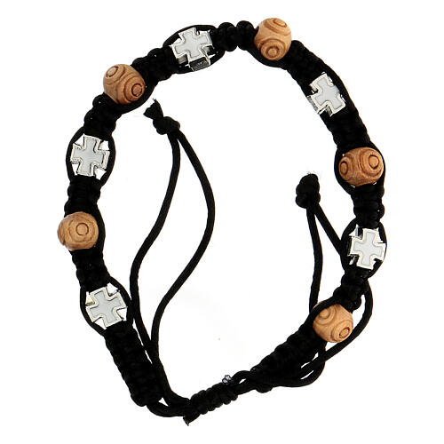 Single decade rosary bracelet of black rope, wood beads 8x6 mm and white cross 1