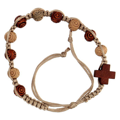 Single decade rosary bracelet of beige rope, wood beads 8x6 mm and crosses 1