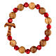 Elastisches Tau-Armband mit Zehner aus Assisi-Holz und mit roten kleinen Perlen von 1 cm s1