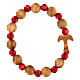 Elastisches Tau-Armband mit Zehner aus Assisi-Holz und mit roten kleinen Perlen von 1 cm s2
