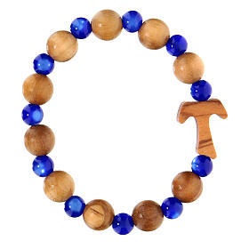 Elastisches Tau-Armband mit Zehner aus Assisi-Holz und mit blauen kleinen Perlen von 1 cm